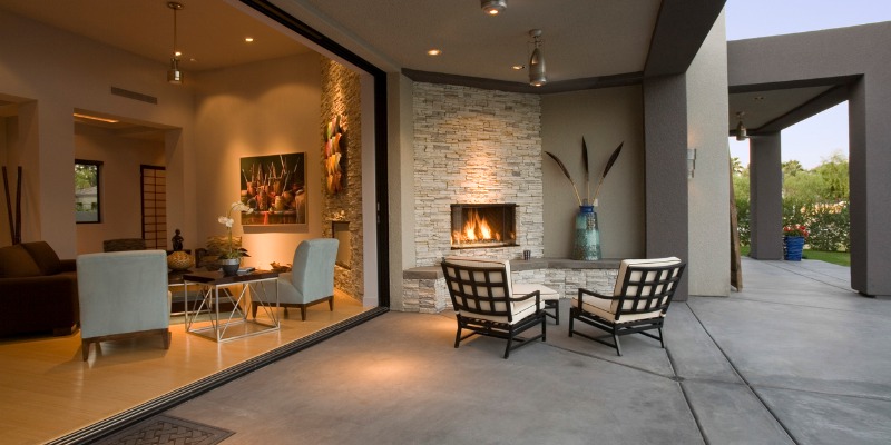 chairs-by-fireplace-in-patio-picture-id467684722