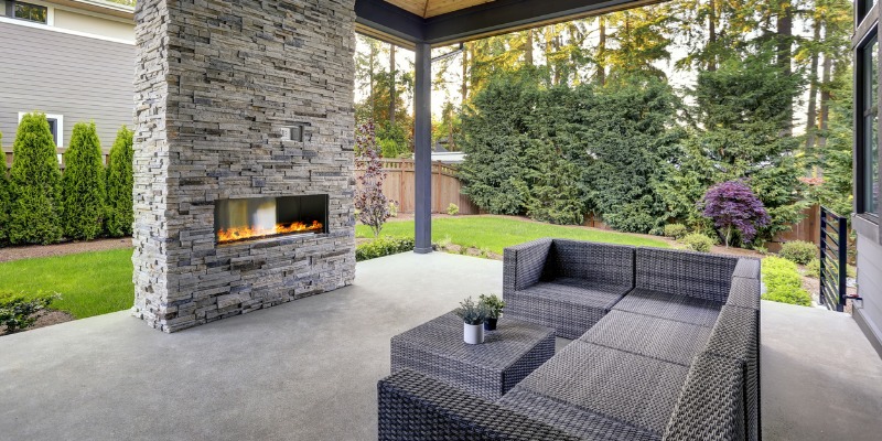 new-modern-home-features-a-backyard-with-patio-picture-id875427470